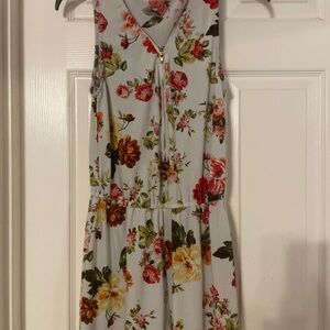 Floral Sleeveless Romper with‎ elastic waist and zipper detail neckline